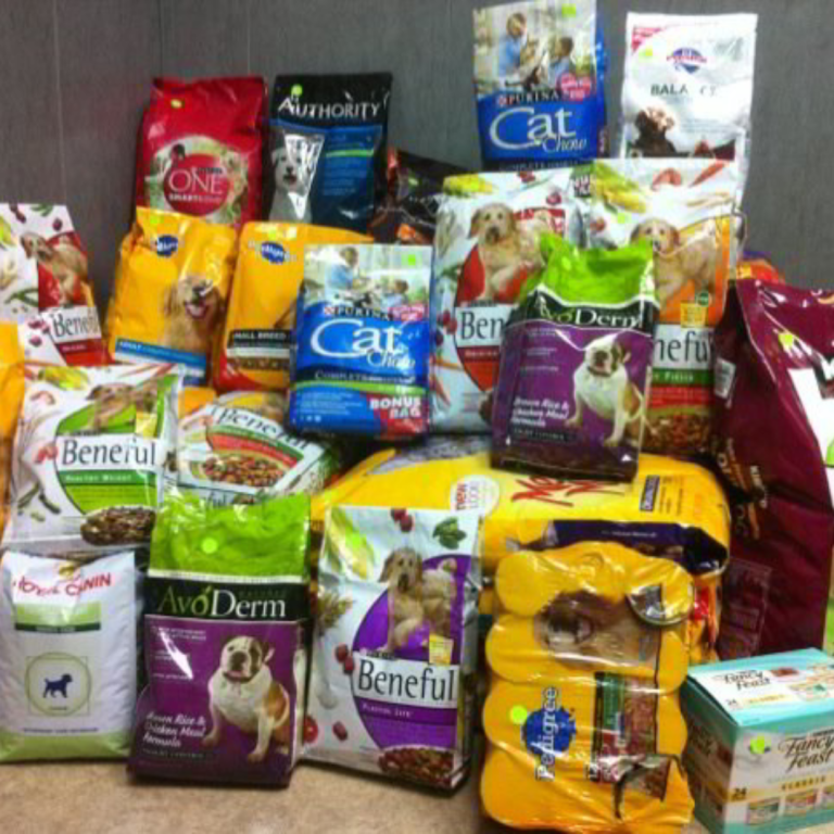 Donation piles of pet food.
